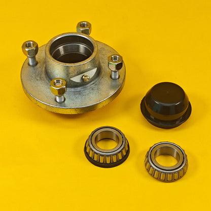 Trailer Wheel Hub 4" PCD Plastic Cap & Conical Nuts Taper Roller Hub for Trailer