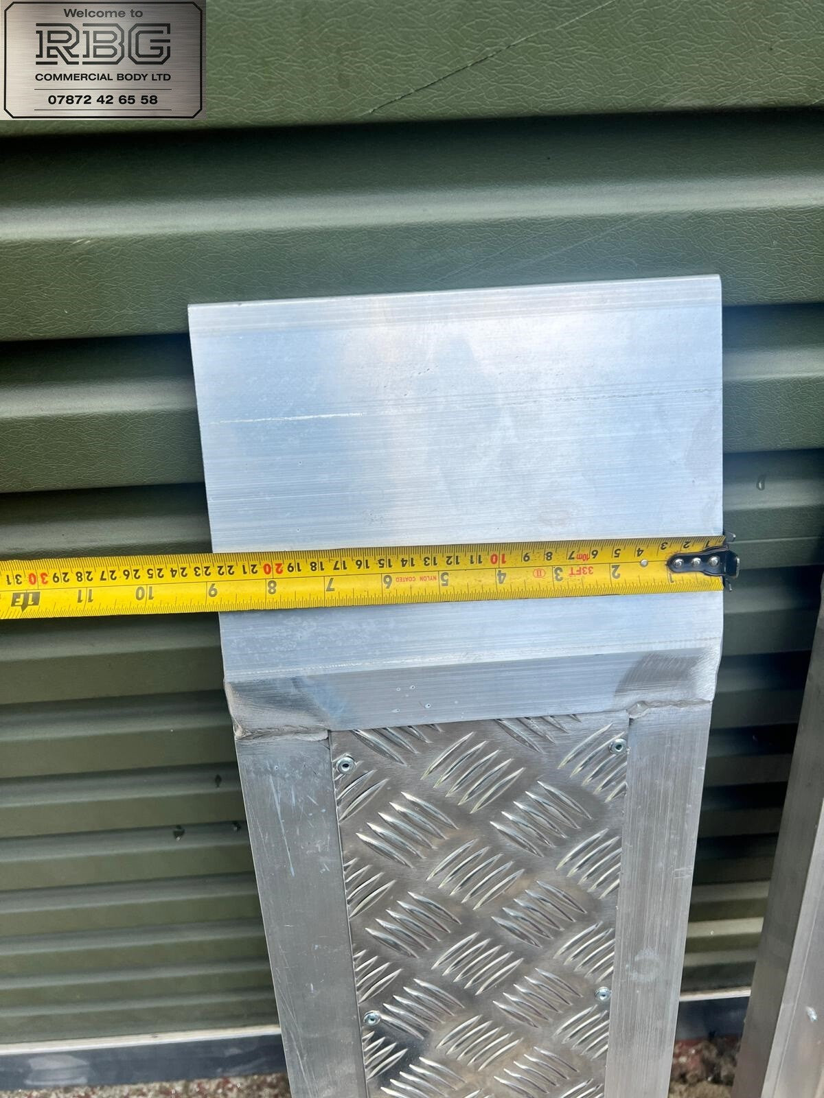 Aluminum car loading ramp extensions for recovery trucks.